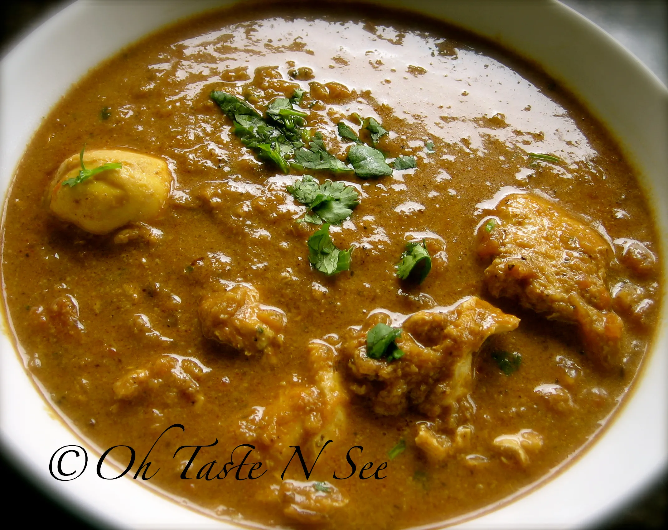 Muttai Kuzhambu(Eggs poached in a curry sauce)