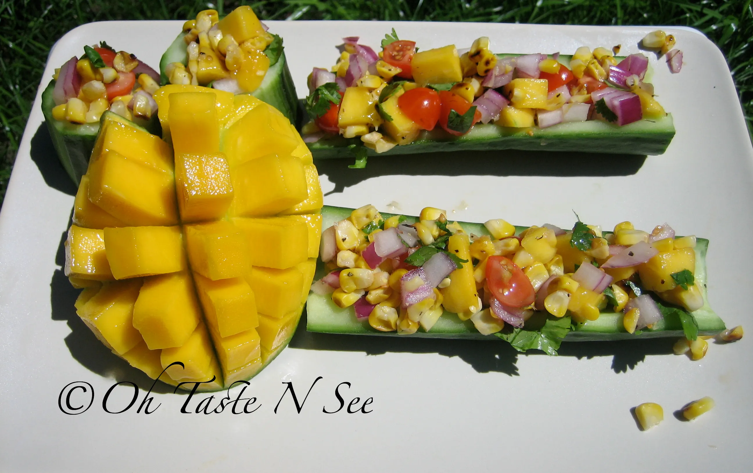 Grilled corn salad in cucumber boats/cups
