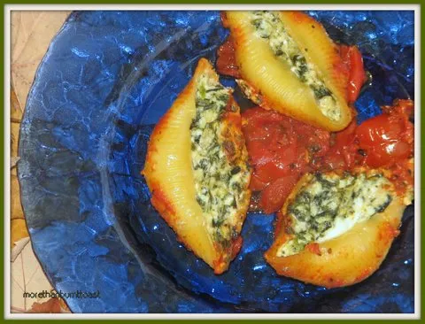 Ricotta and spinach stuffed shells in marinara sauce